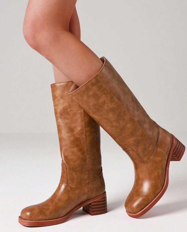 Light Brown Women’s Insulated Comfort Knee-High Boots with Everyday Edge on the model