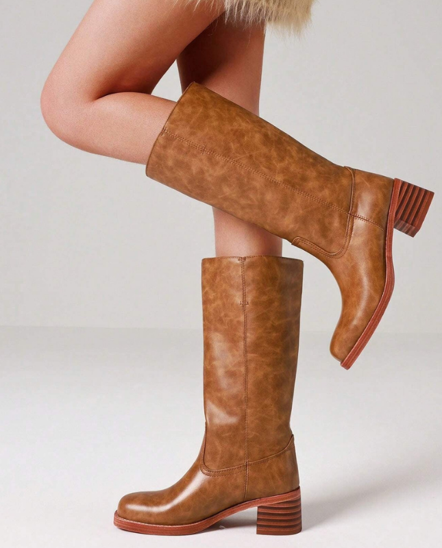 Light Brown Women’s Insulated Comfort Knee-High Boots with Everyday Edge on the model