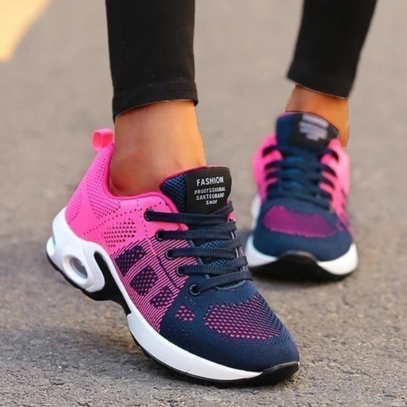Navy Blue/Pink Women's Lightweight Comfort Active Sneakers on model