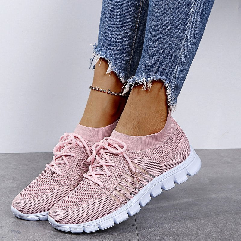 Pink Women’s Breathable Mesh Walking Sneakers on the model