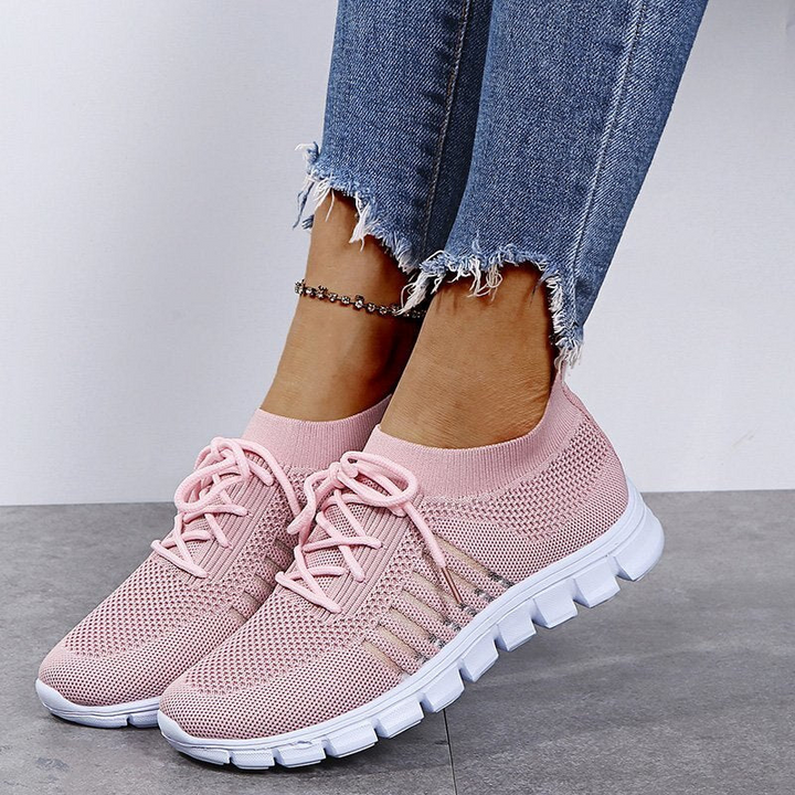 Pink Women’s Breathable Mesh Walking Sneakers on the model
