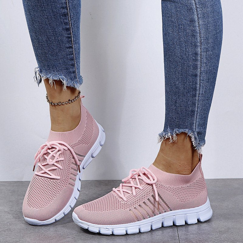 Pink Women’s Breathable Mesh Walking Sneakers on the model