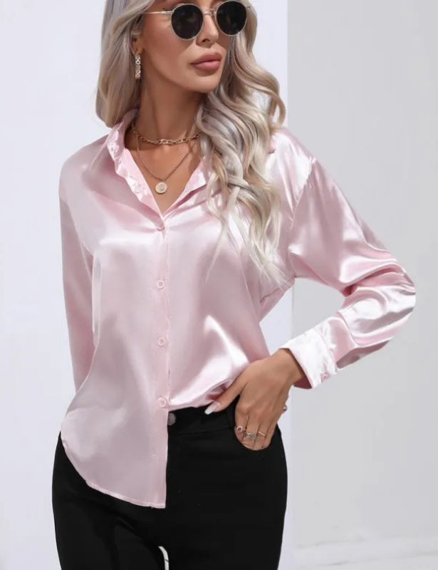 Pink Women’s Relaxed Button-Up Blouse on the model