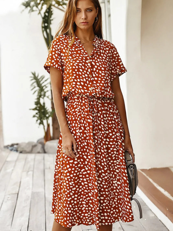 Red Orange Women’s Breezy Printed Midi Summer Dress with Short Sleeves on the model