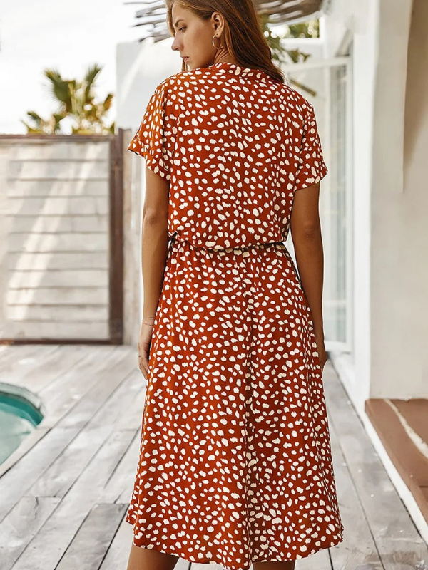Red Orange Women’s Breezy Printed Midi Summer Dress with Short Sleeves on the model