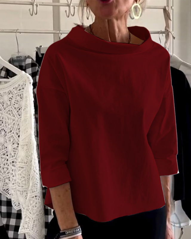 Red Women’s 3/4 Sleeve Relaxed Fit Boat Neck Blouse on the model