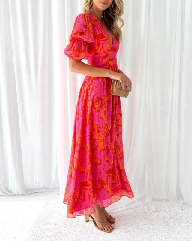 Red Women’s Floral Puff Sleeve V-Neck Maxi Dress on the model