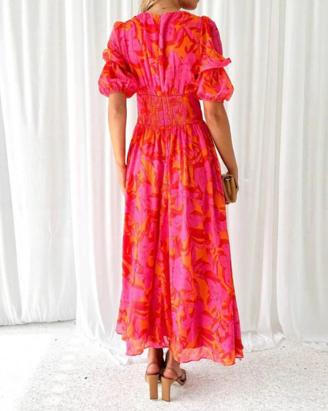 Red Women’s Floral Puff Sleeve V-Neck Maxi Dress on the model