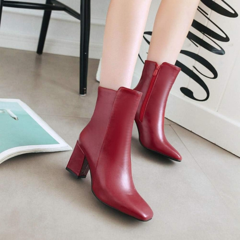 Red Women’s Sleek Side-Zip Ankle Boots with Comfortable Heel on the model