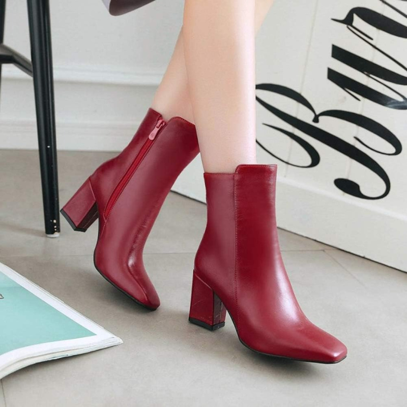 Red Women’s Sleek Side-Zip Ankle Boots with Comfortable Heel on the model