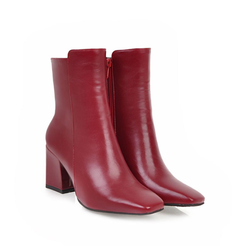 Red Women’s Sleek Side-Zip Ankle Boots with Comfortable Heel on the model
