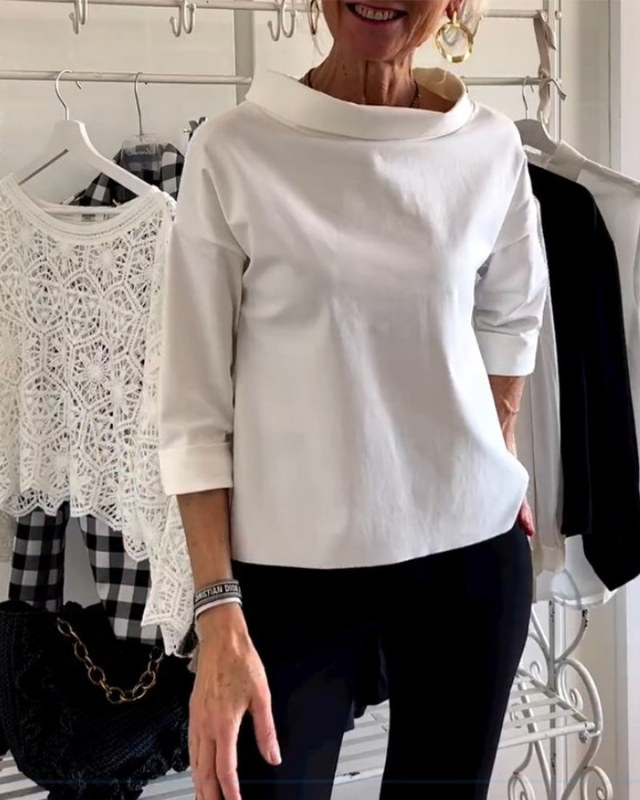 White Women’s 3/4 Sleeve Relaxed Fit Boat Neck Blouse on the model