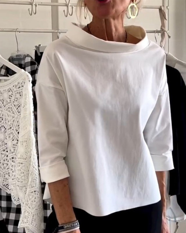 White Women’s 3/4 Sleeve Relaxed Fit Boat Neck Blouse on the model