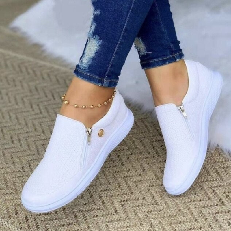 White Women’s Elegant Comfort Fashion Sneakers on the model