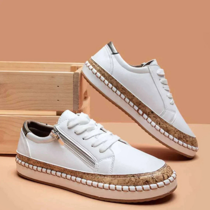 White Women’s Embroidered Breathable Comfort Slip-On Shoes on the model