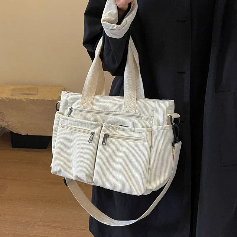 White Women’s Everyday Multi-Pocket Bag on the model