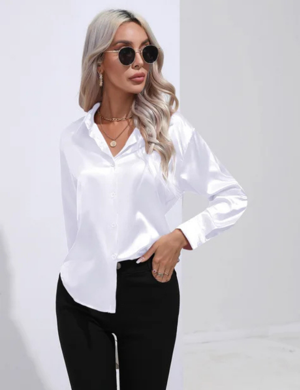 White Women’s Relaxed Button-Up Blouse on the model