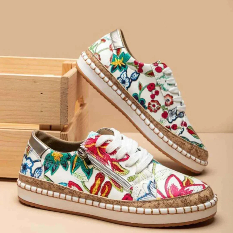 White/Red Women’s Embroidered Breathable Comfort Slip-On Shoes on the model