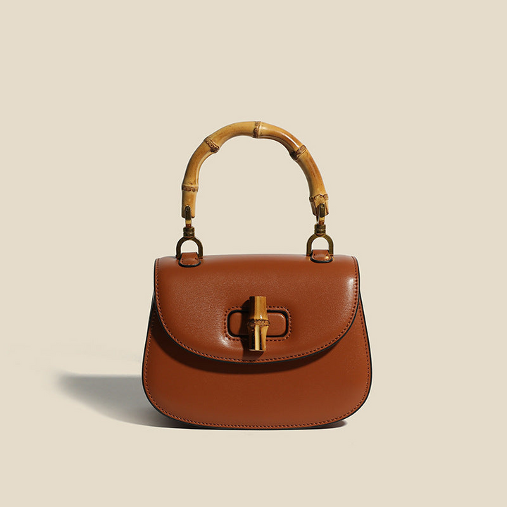 Women's Leather Handbag with Bamboo Detailing and Adjustable Shoulder Strap