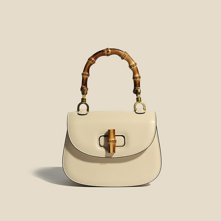 Women's Leather Handbag with Bamboo Detailing and Adjustable Shoulder Strap