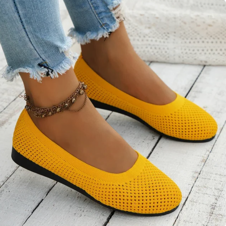 Yellow Women’s Breathable Mesh Slip-On Flats on the model