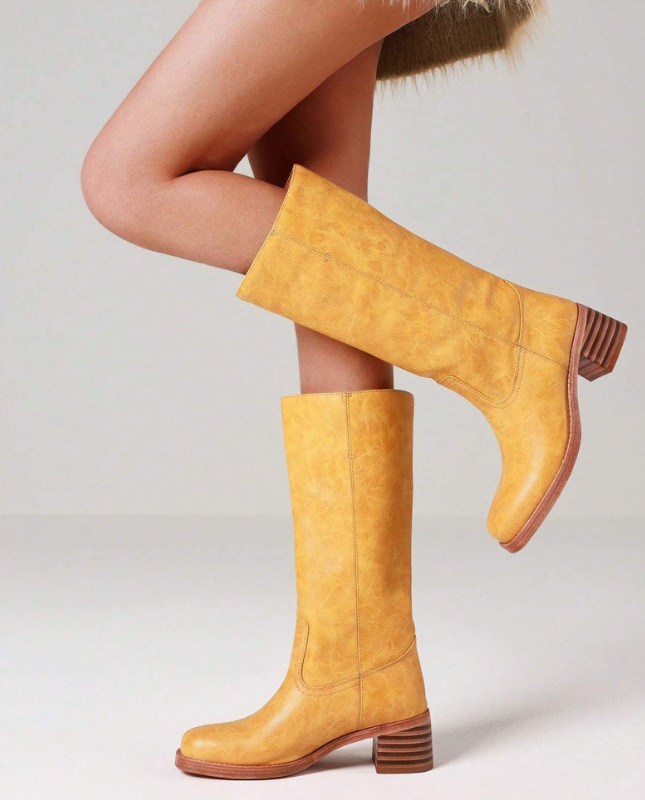 Yellow Women’s Insulated Comfort Knee-High Boots with Everyday Edge on the model