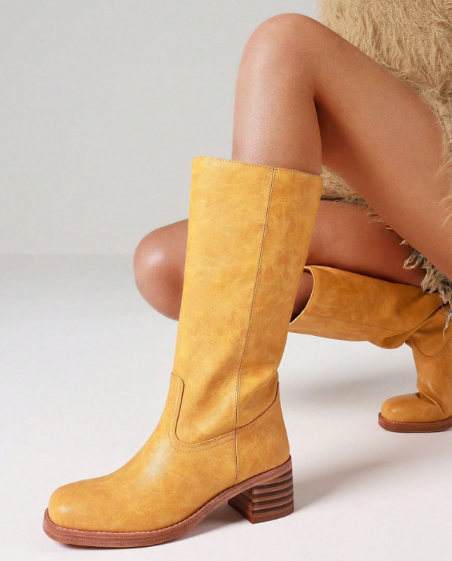 Yellow Women’s Insulated Comfort Knee-High Boots with Everyday Edge on the model